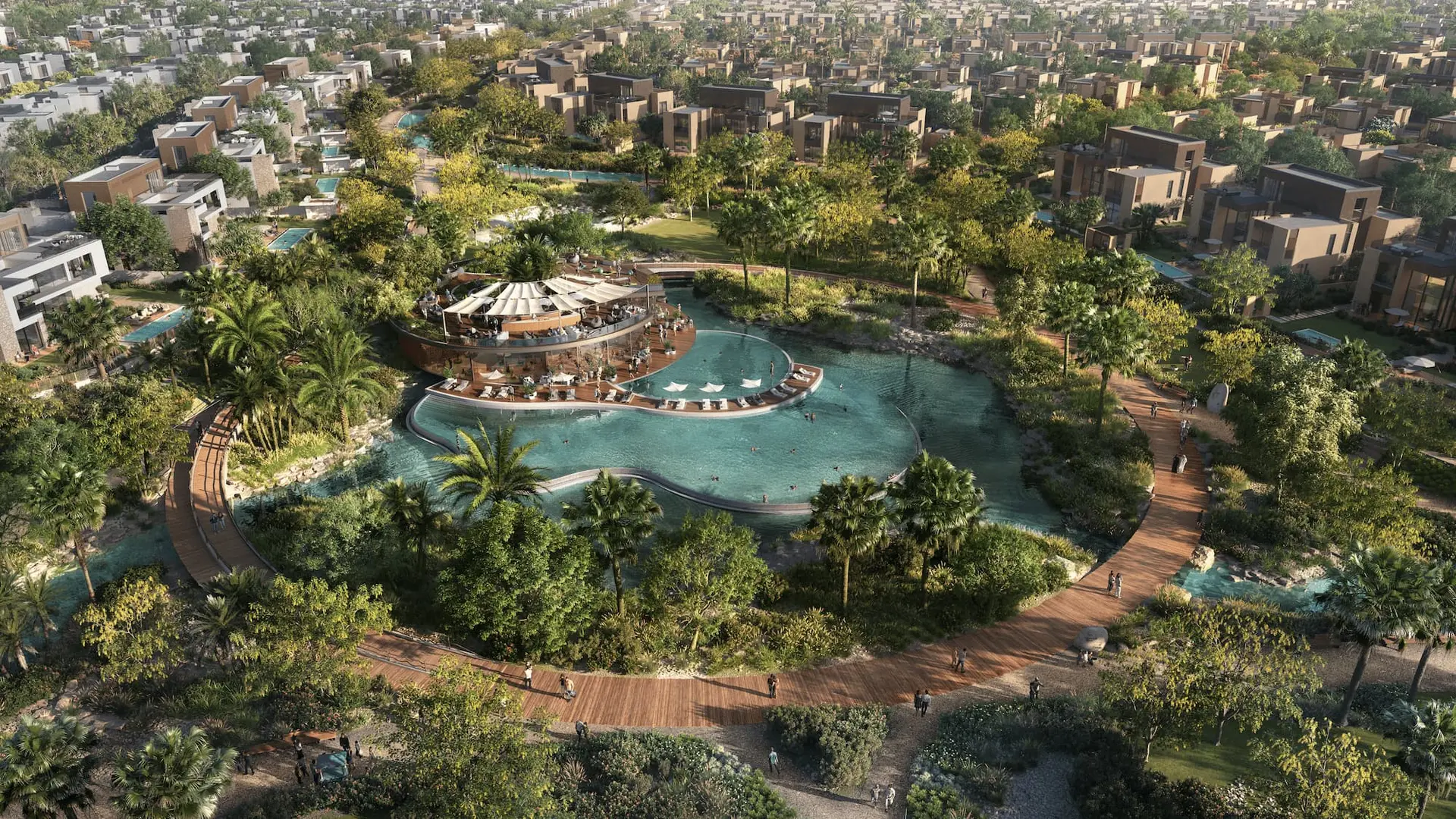 Aerial view of Haven by Aldar, the central lagoon and clubhouse ringed by villas